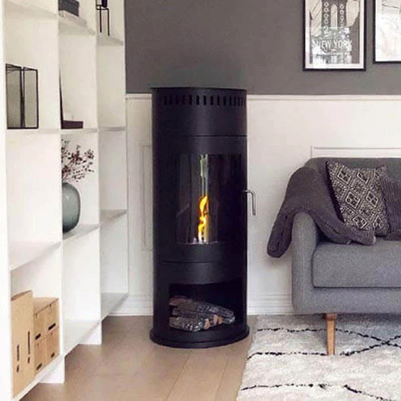 Washington black bioethanol stove lit beside white shelving and a grey sofa