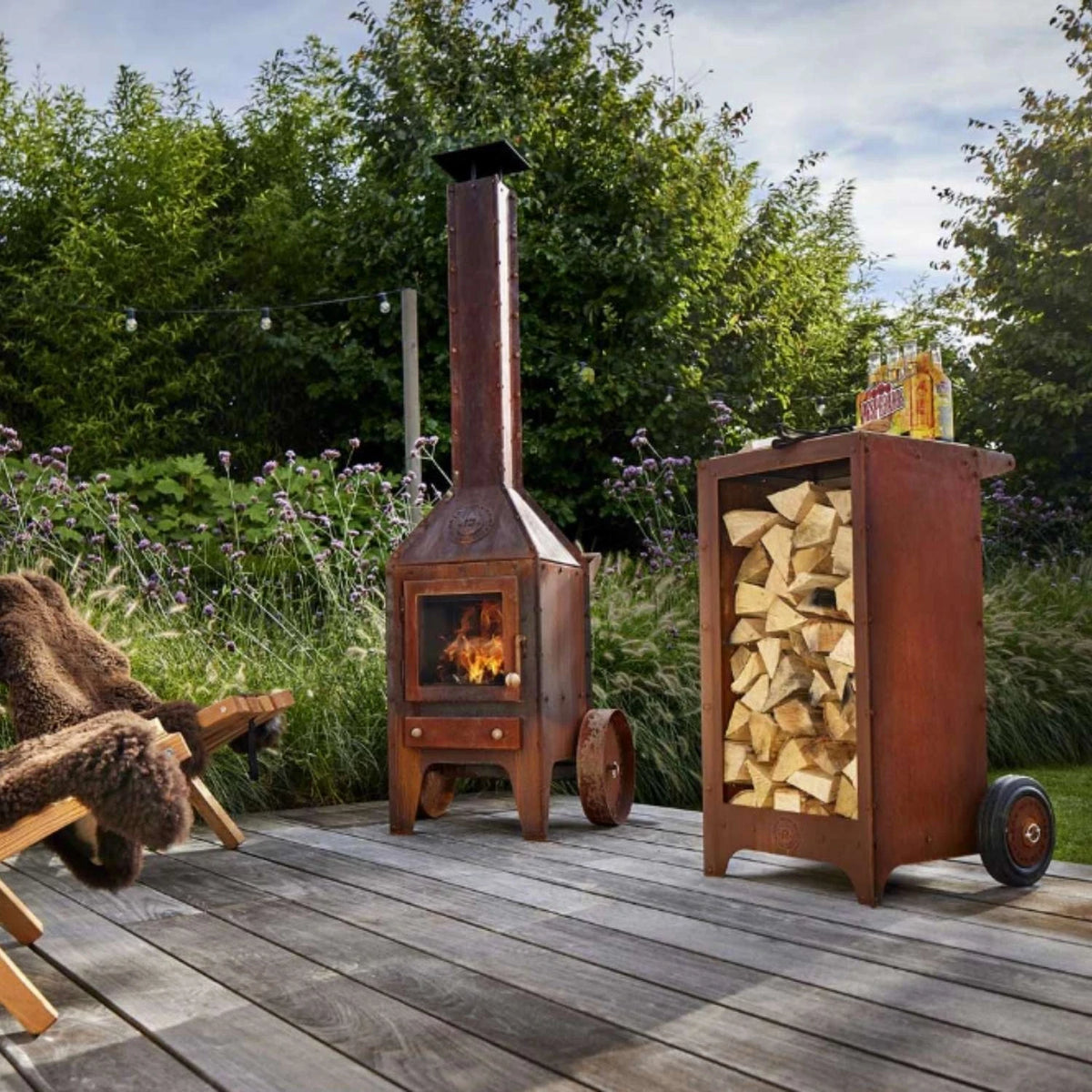 Ker Log Storage, a compact and durable solution for storing firewood in outdoor spaces like gardens and patios.