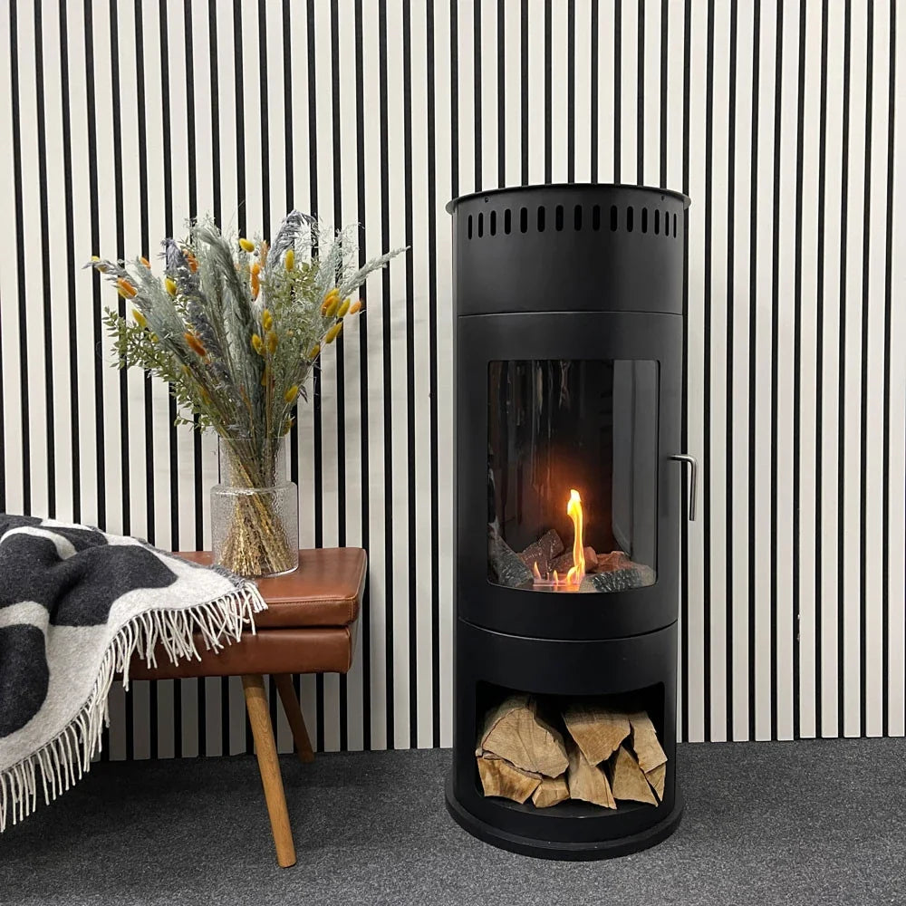 Washington black bioethanol stove lit against white acoustic wall panels beside a leather bench
